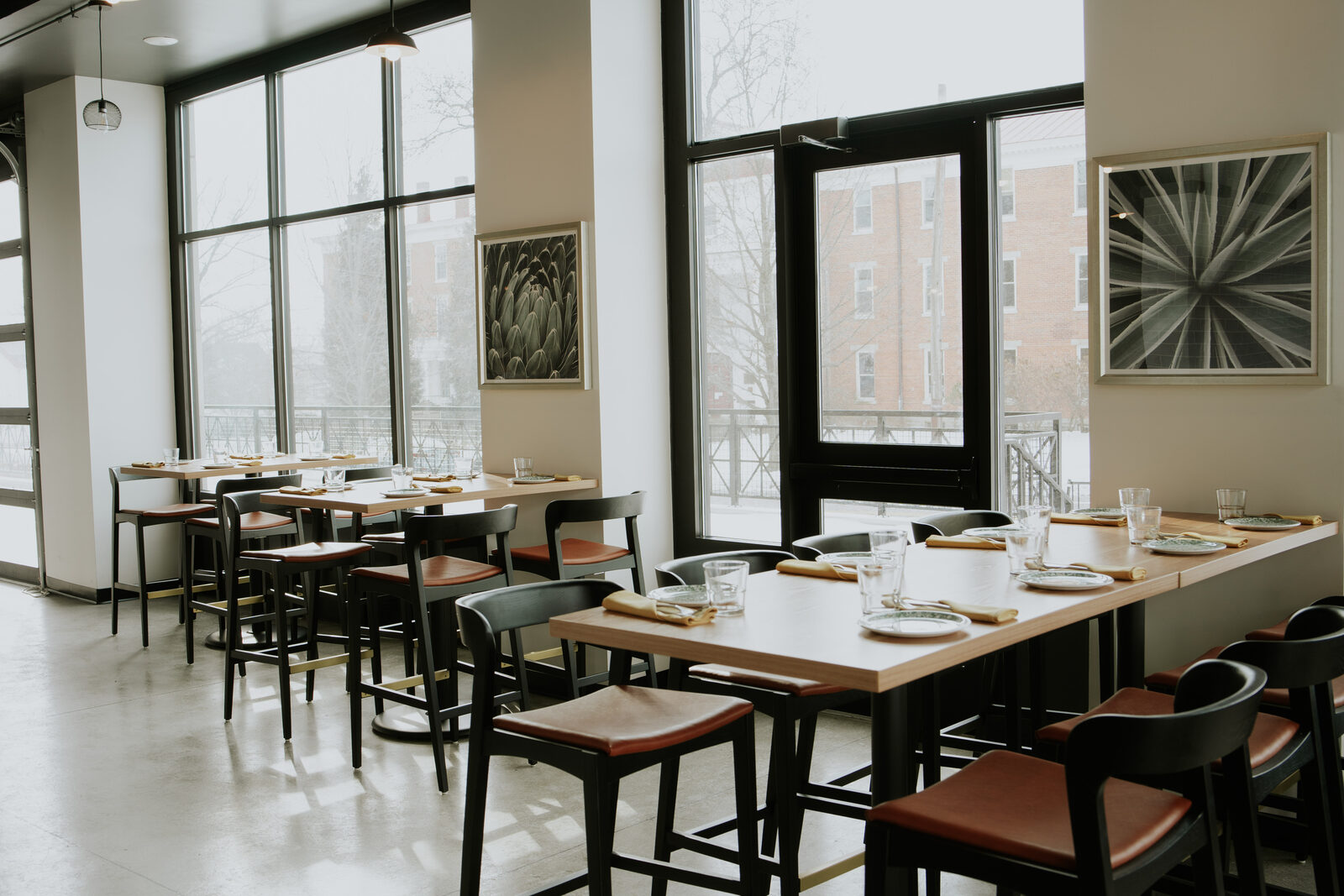 Window-side dining area at Calendula