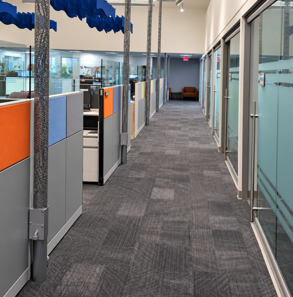 Office corridor and glass-front rooms at Primary Health Solutions